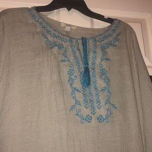 Olive/Teal cloak-like top.